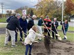 A group with shovels at the groundbreaking ceremony